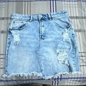 Distressed jean skirt